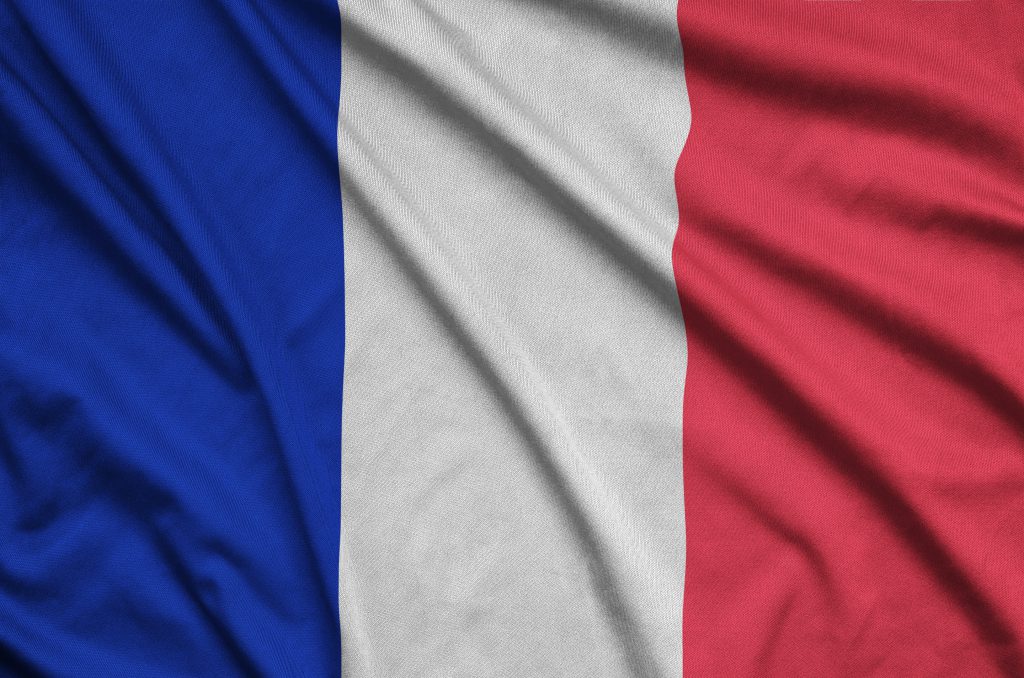 France flag  is depicted on a sports cloth fabric with many folds. Sport team waving banner