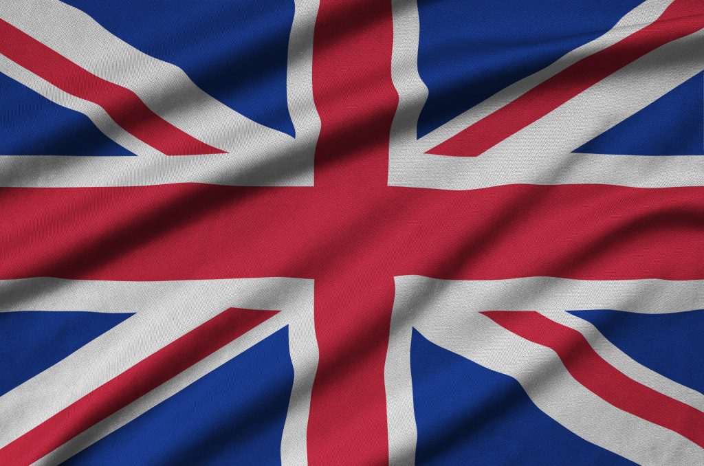 Great britain flag  is depicted on a sports cloth fabric with many folds. Sport team waving banner