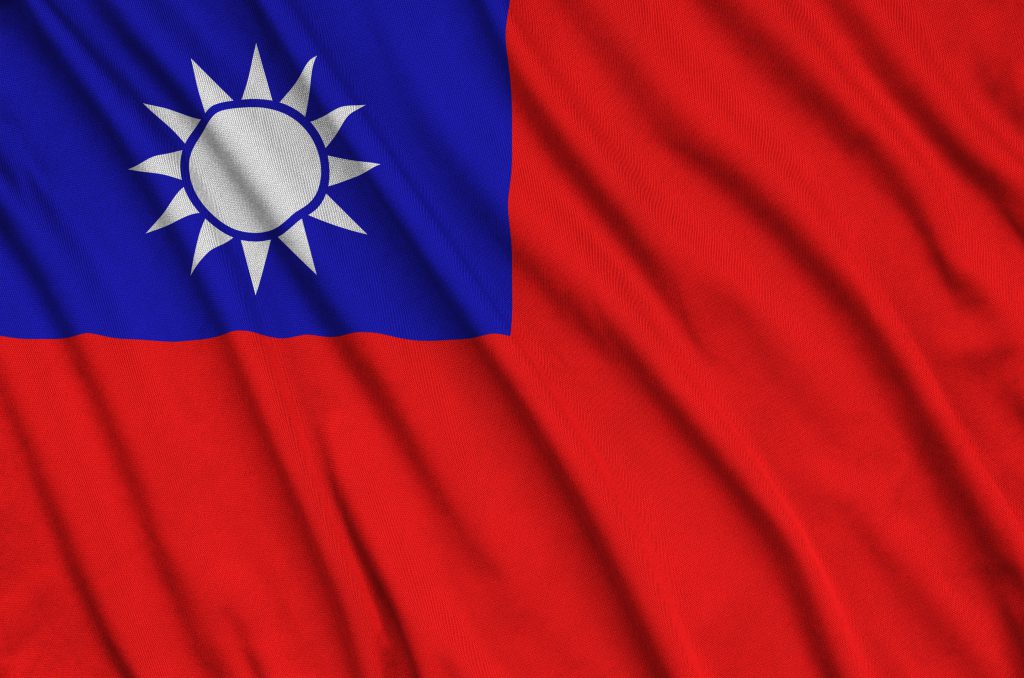 Taiwan flag  is depicted on a sports cloth fabric with many folds. Sport team waving banner
